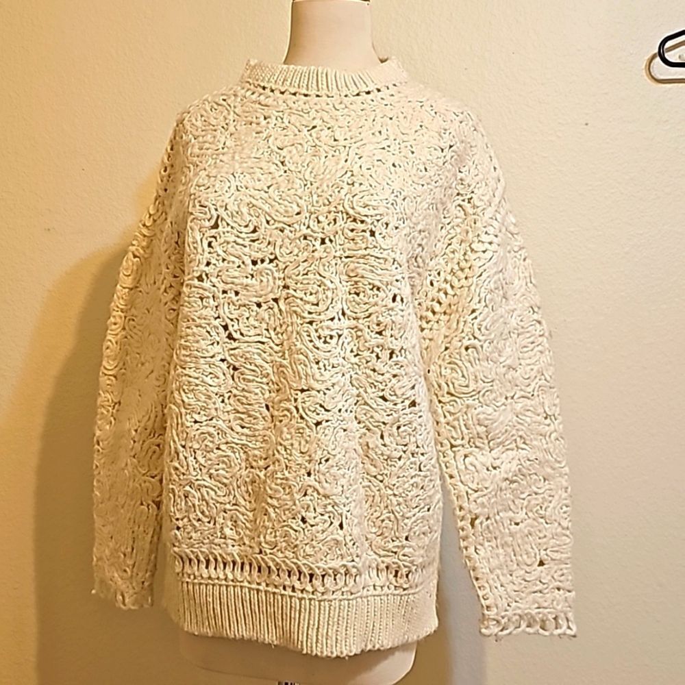 Alexander McQueen knit sweater.